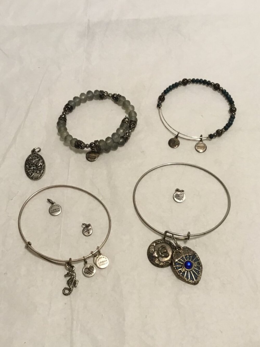 Very nice lot of vintage Alex & Ani charm bracelets and extra charms